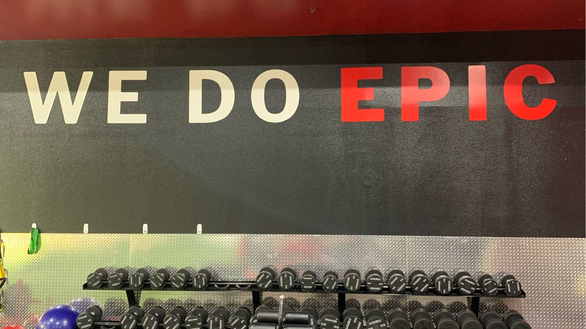 Black wall with large red EPIC lettering